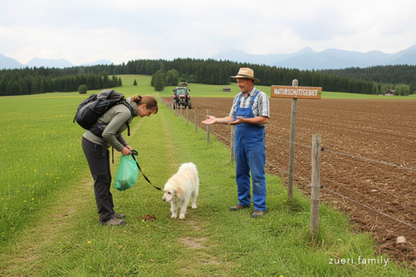 Bauer und Hundehalter in harmonischer Koexistenz